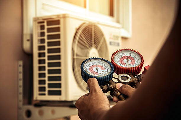 Professional Hvac technician working in Milford, MI